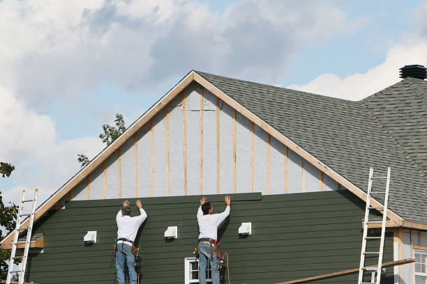 Professional Siding Replacement technician working in Woodford, VA